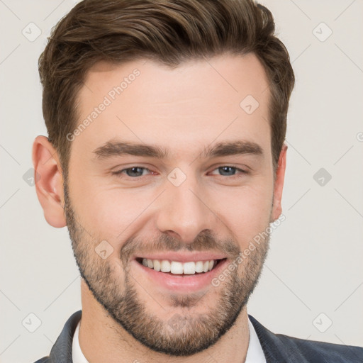 Joyful white young-adult male with short  brown hair and brown eyes