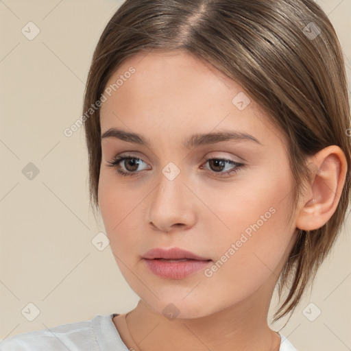 Neutral white young-adult female with medium  brown hair and brown eyes