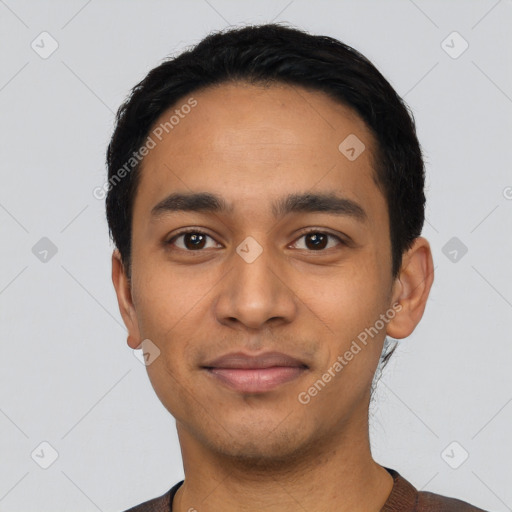 Joyful latino young-adult male with short  black hair and brown eyes