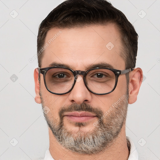 Neutral white adult male with short  brown hair and brown eyes