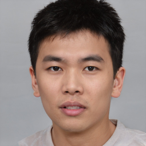 Neutral asian young-adult male with short  black hair and brown eyes