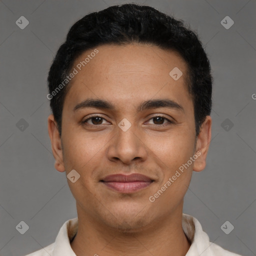 Joyful latino young-adult male with short  black hair and brown eyes