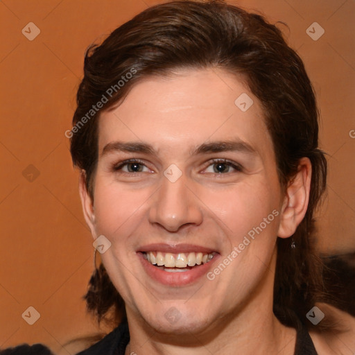 Joyful white young-adult male with medium  brown hair and brown eyes