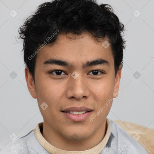 Joyful latino young-adult male with short  brown hair and brown eyes