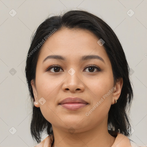 Joyful asian young-adult female with medium  black hair and brown eyes