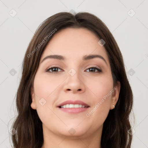 Joyful white young-adult female with long  brown hair and grey eyes