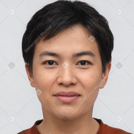 Joyful asian young-adult male with short  black hair and brown eyes