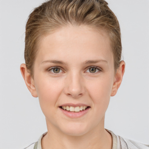 Joyful white young-adult female with short  brown hair and grey eyes