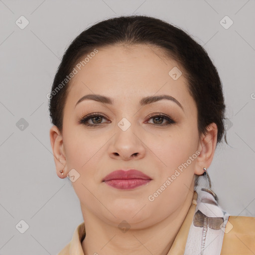 Joyful asian young-adult female with short  brown hair and brown eyes