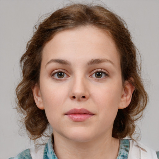 Neutral white child female with medium  brown hair and blue eyes