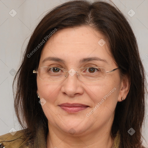 Joyful white adult female with medium  brown hair and brown eyes