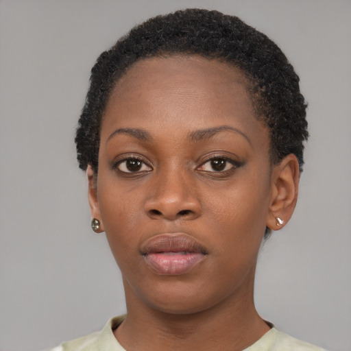Neutral black young-adult female with short  black hair and brown eyes