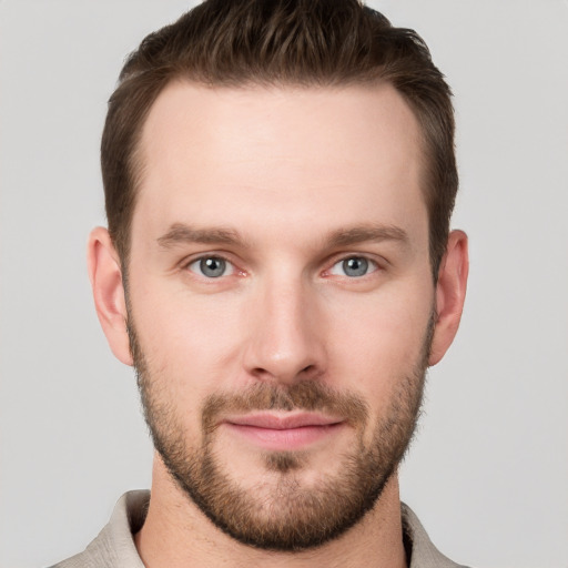 Neutral white young-adult male with short  brown hair and grey eyes