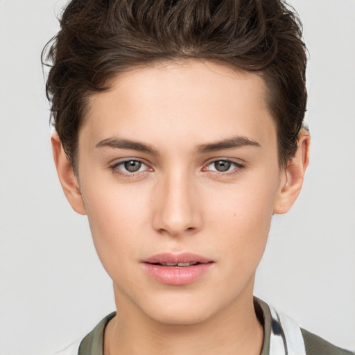 Neutral white young-adult female with short  brown hair and brown eyes