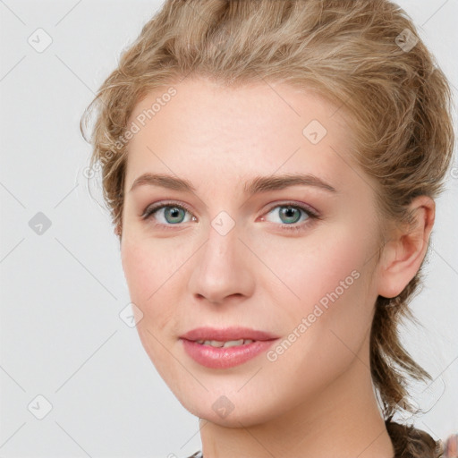 Joyful white young-adult female with medium  brown hair and blue eyes