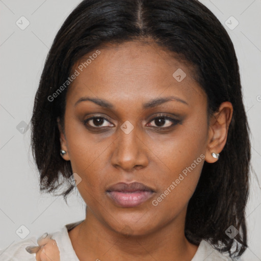 Neutral black young-adult female with medium  brown hair and brown eyes