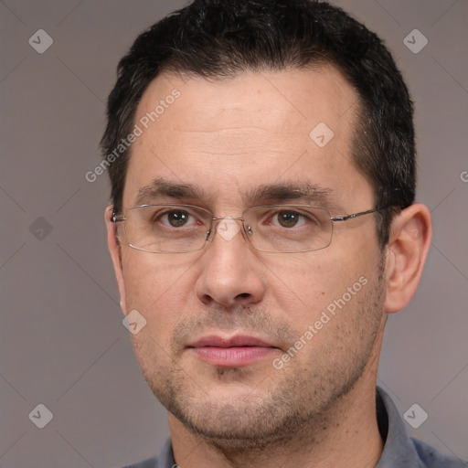 Joyful white adult male with short  brown hair and brown eyes