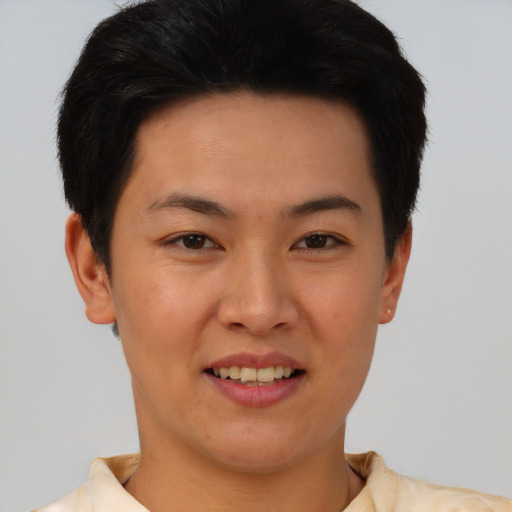 Joyful white young-adult female with short  black hair and brown eyes