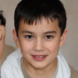 Joyful white child male with short  brown hair and brown eyes