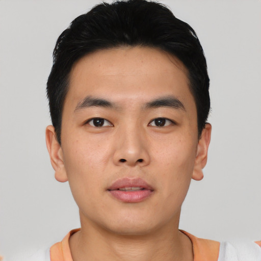 Neutral asian young-adult male with short  black hair and brown eyes
