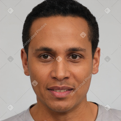 Joyful latino young-adult male with short  black hair and brown eyes