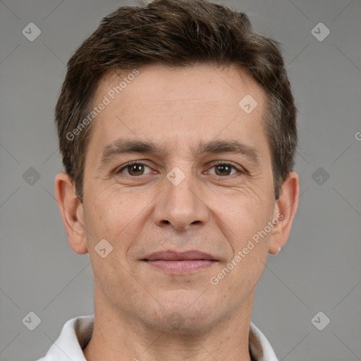 Joyful white adult male with short  brown hair and brown eyes