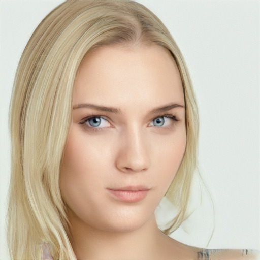 Neutral white young-adult female with long  blond hair and blue eyes