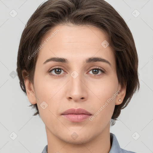 Neutral white young-adult female with medium  brown hair and brown eyes