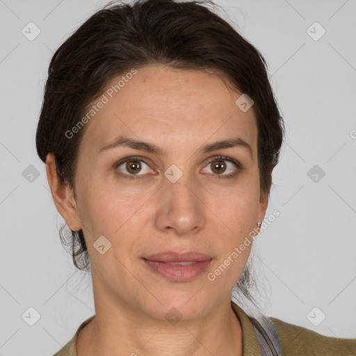 Joyful white adult female with short  brown hair and brown eyes