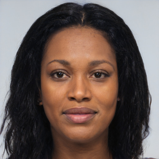 Joyful asian young-adult female with long  black hair and brown eyes