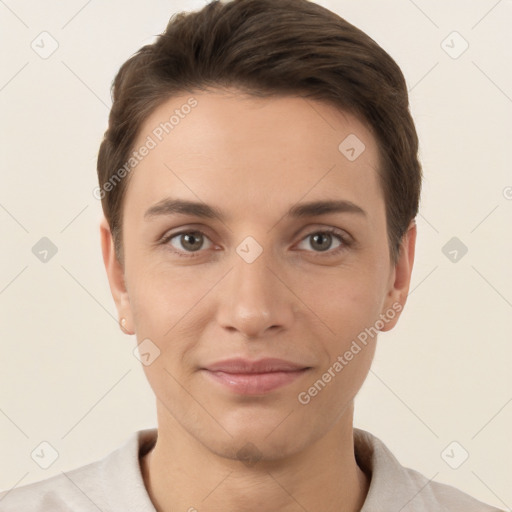 Joyful white young-adult female with short  brown hair and brown eyes