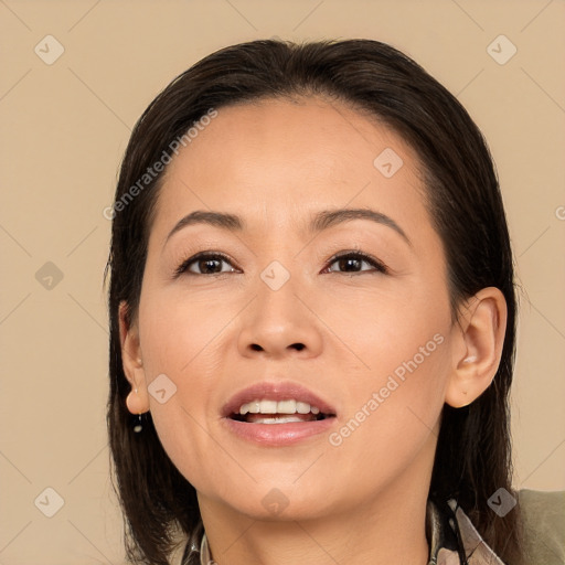 Joyful white adult female with medium  brown hair and brown eyes