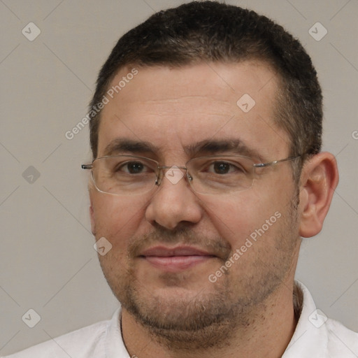 Joyful white adult male with short  brown hair and brown eyes