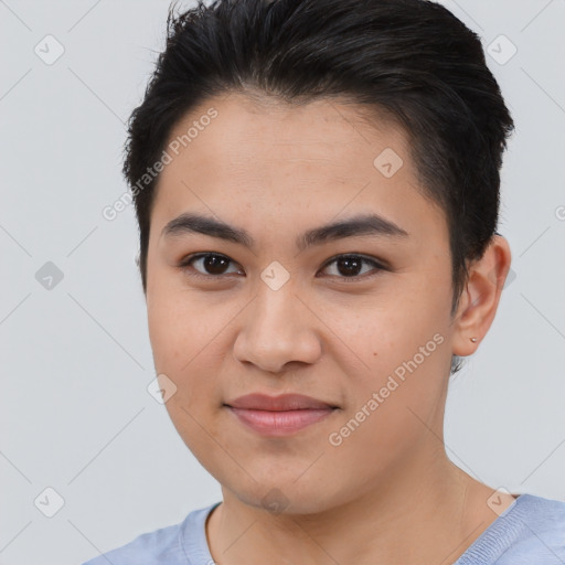 Joyful asian young-adult female with short  brown hair and brown eyes