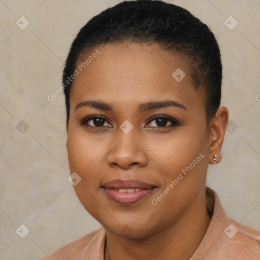 Joyful black young-adult female with short  brown hair and brown eyes