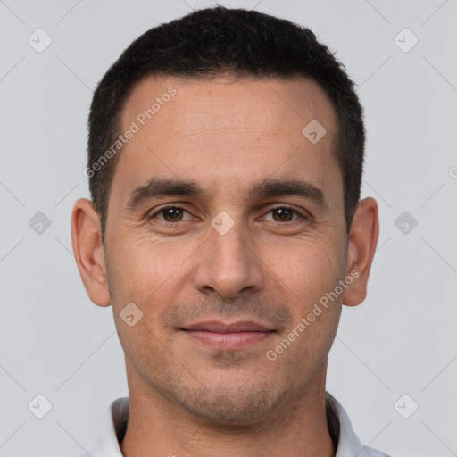 Joyful white young-adult male with short  brown hair and brown eyes