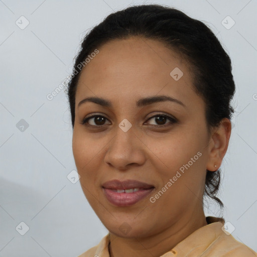 Joyful latino young-adult female with long  brown hair and brown eyes