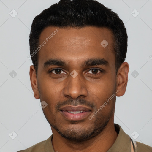 Joyful latino young-adult male with short  black hair and brown eyes