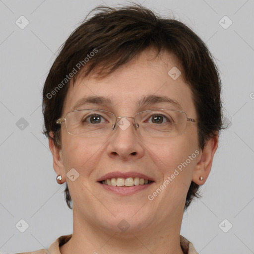 Joyful white adult female with short  brown hair and brown eyes