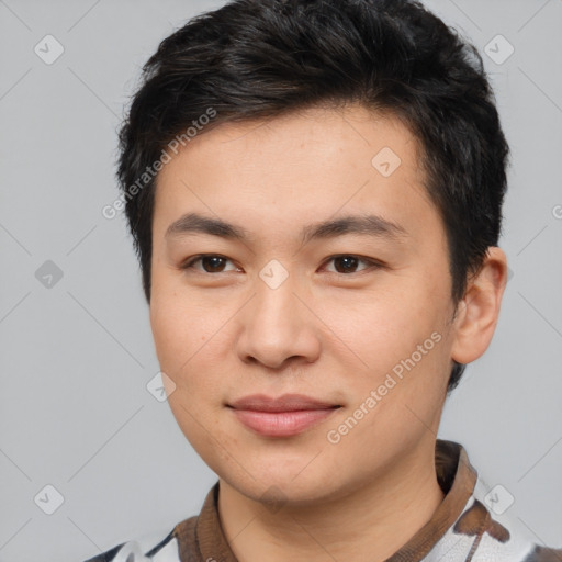 Joyful asian young-adult male with short  brown hair and brown eyes