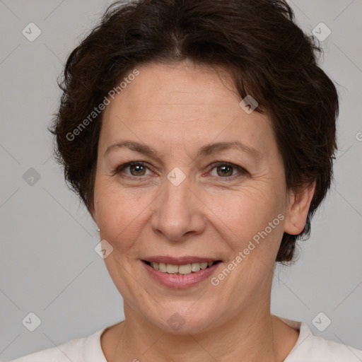 Joyful white adult female with short  brown hair and brown eyes