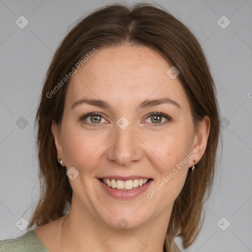 Joyful white young-adult female with medium  brown hair and grey eyes