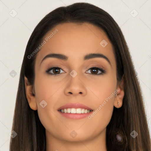 Joyful latino young-adult female with long  brown hair and brown eyes