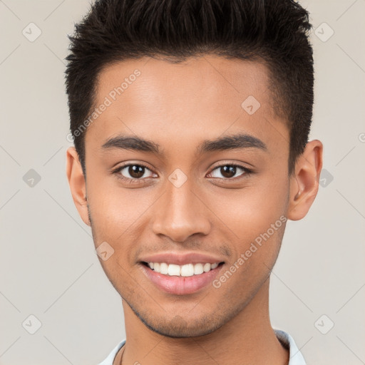 Joyful white young-adult male with short  brown hair and brown eyes