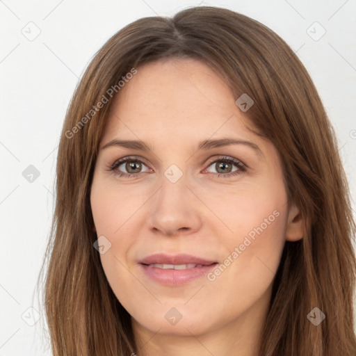 Joyful white adult female with long  brown hair and brown eyes