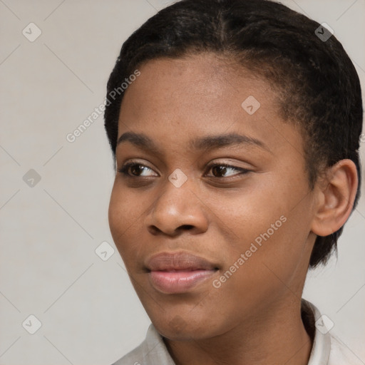 Joyful black young-adult female with short  brown hair and brown eyes