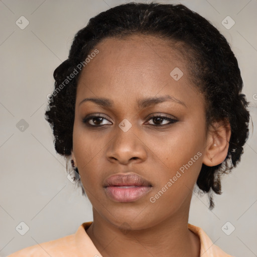 Neutral black young-adult female with medium  brown hair and brown eyes