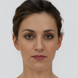 Neutral white young-adult female with short  brown hair and brown eyes