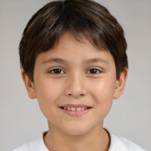 Joyful white child male with short  brown hair and brown eyes
