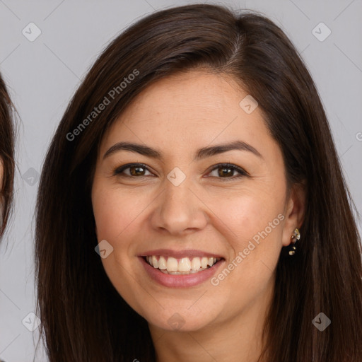 Joyful white young-adult female with long  brown hair and brown eyes